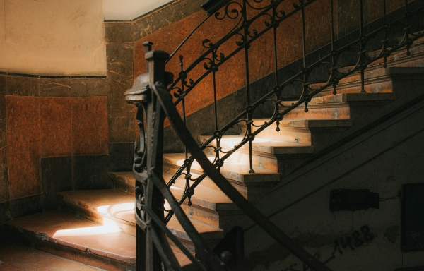 Restaurant Patron Slips on Dimly Lit Staircase